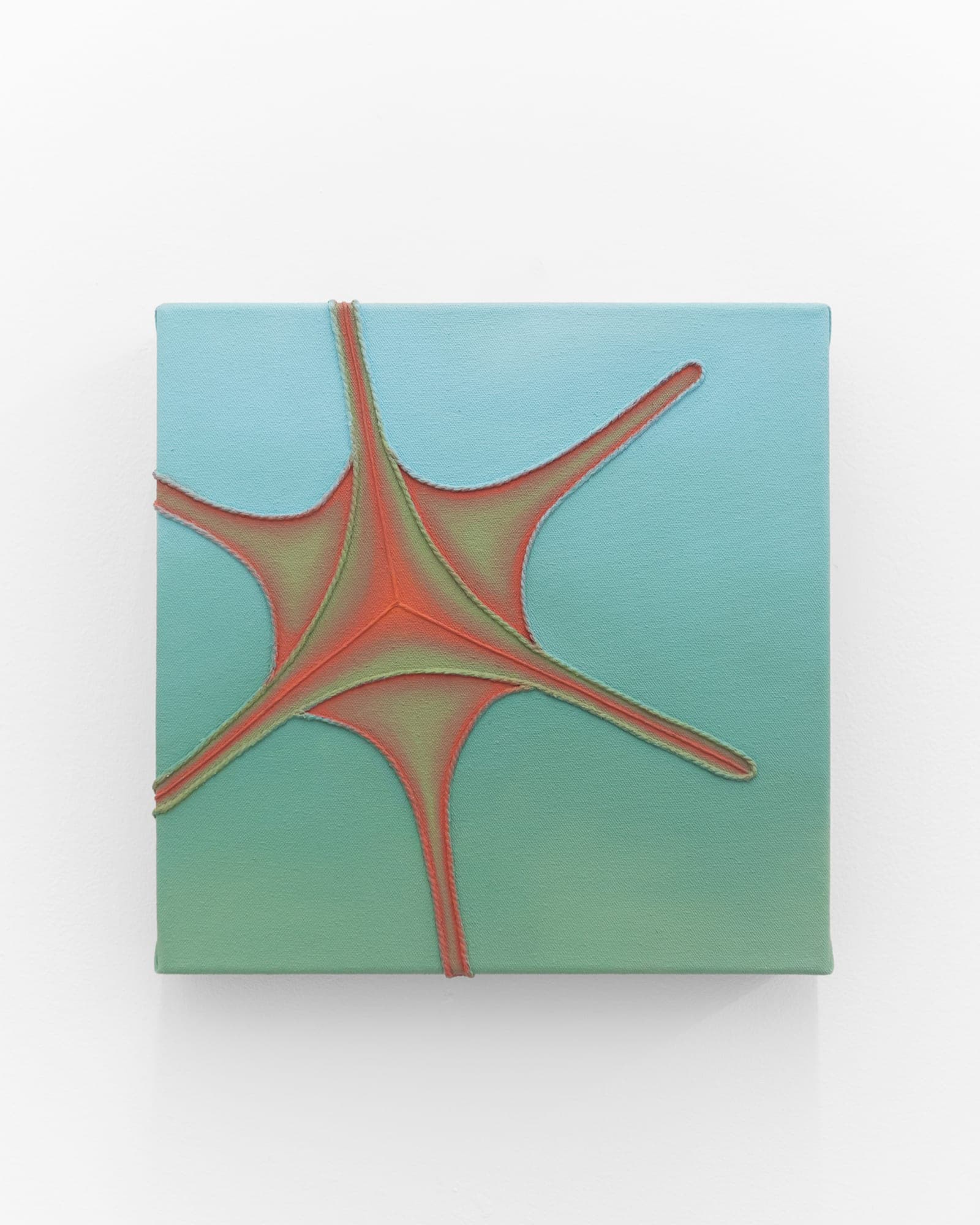 Teal painting with a soft red and yellow star burst at the center