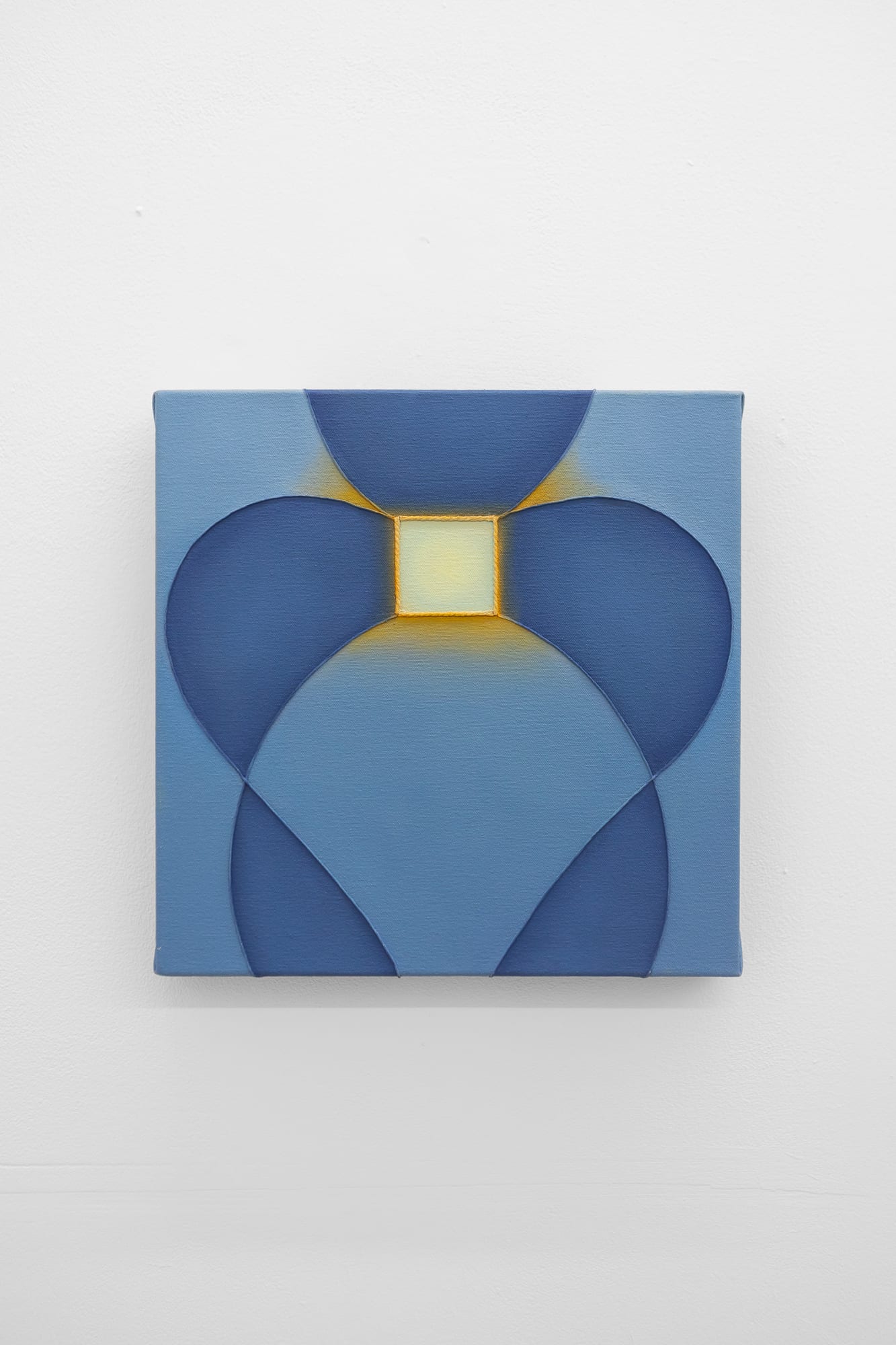 Vertical blue painting with darker blue petal forms and a glowing yellow center